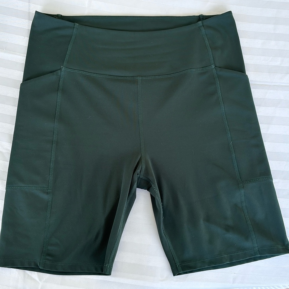 Girlfriend Collective High Rise Pocket Bike Short in Moss